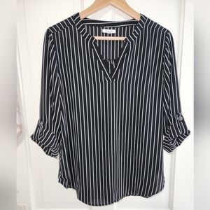 Maurices women's top size medium. Rayon material. Fits like a large. Like new